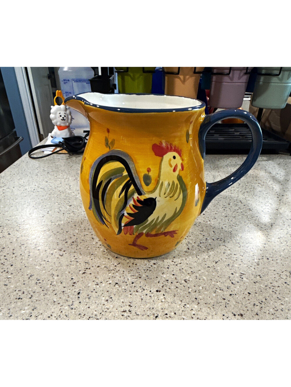 Dennis East Rooster Pattern Yellow Ceramic Pitcher, Blue Handle & Spout